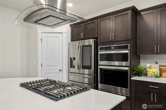 Check out the pantry for added storage space on top of the cabinetry lined kitchen!