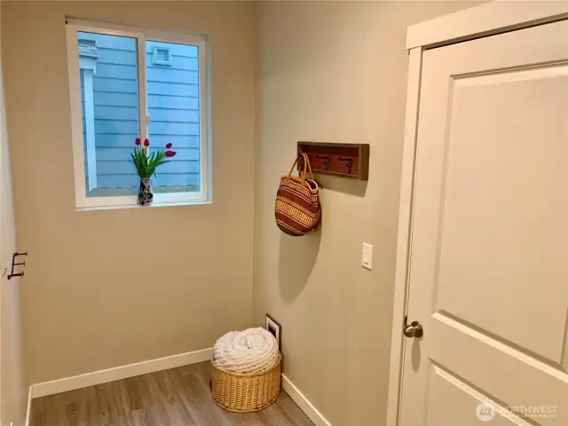 Mudroom to oversized 2 car garage with shelves