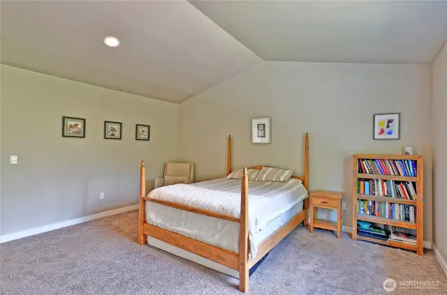 Primary bedroom with vaulted ceilings and lots of room