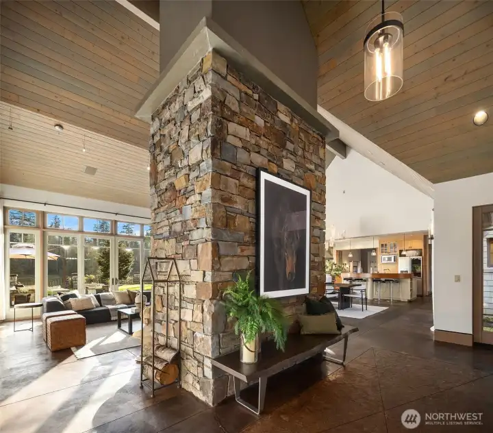 Floor to ceiling fireplace and vaulted ceilings