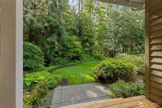 The lush grounds include trails that go beyond the grassy area shown here.