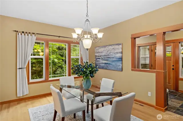 The formal dining room is open and spacious and can easily accommodate a table for 8 or more!