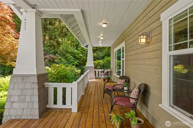 You will never tire of sitting out on the covered front porch enjoying the lush landscaping all around you!