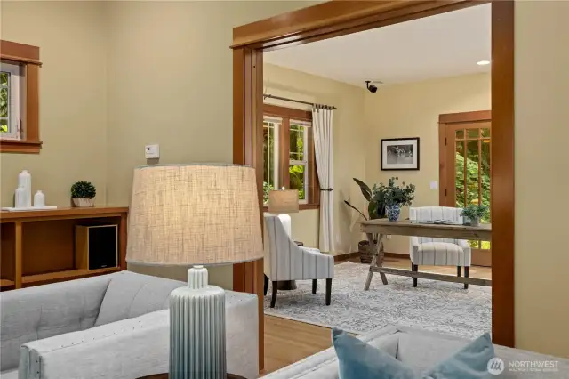 This view is looking from the great room into the adjoining family room/den which can be closed off with the pocket doors.