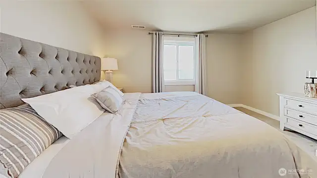 Second bedroom upstairs, with view of the water