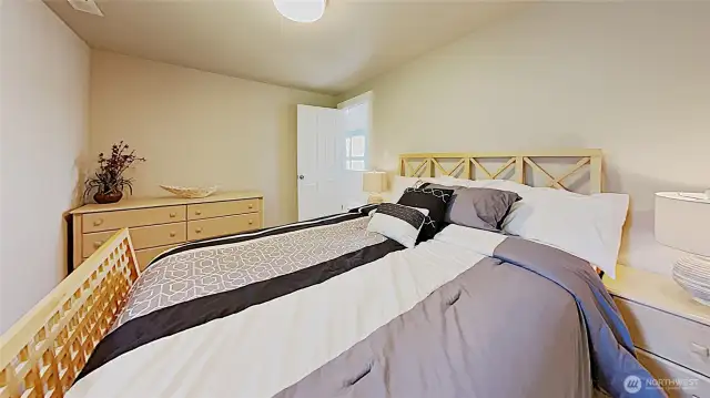 Third bedroom upstairs, with view of driveway