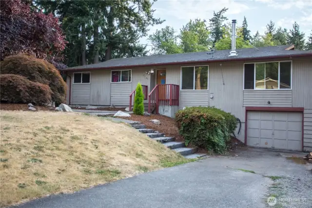 large driveway with RV parking area.