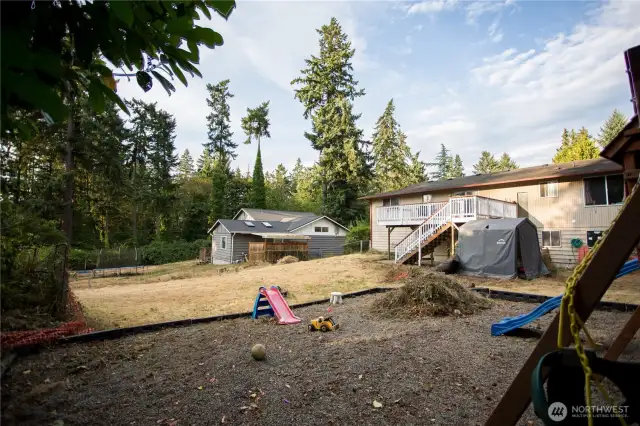 hard to find large lot with a play toy for kids or adults and all the neighbors.  Imagine all the possibilities you could do in such a large yard.  Fire Pit?  Soccer? Corn Hole?