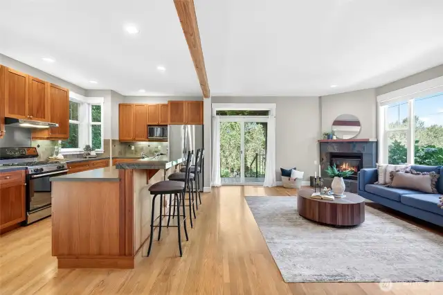 Open living and dining with views of the surrounding gardens