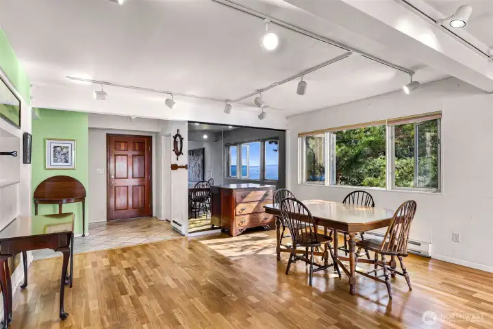 Looking into dining from fireplace in living room