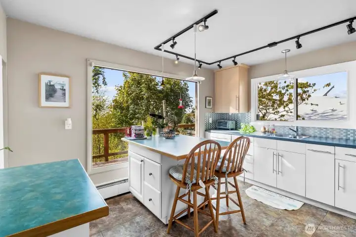 Updated kitchen with breakfast bar and modern finishes. Great for casual dining or conversation.