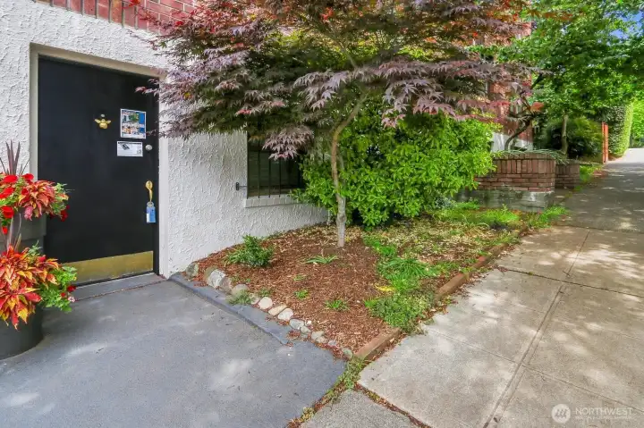 A convenient exterior entrance for #105 is at southwest corner of the building.