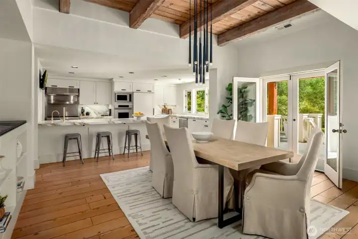 2. The light-filled modern farmhouse boasts natural wide-plank hardwoods from Pier 66, reclaimed timber ceilings, dream kitchen and generous entertaining deck.