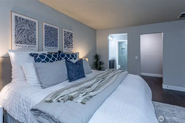 Primary suite fits a king size bed.  Private bathroom & walk in closet.