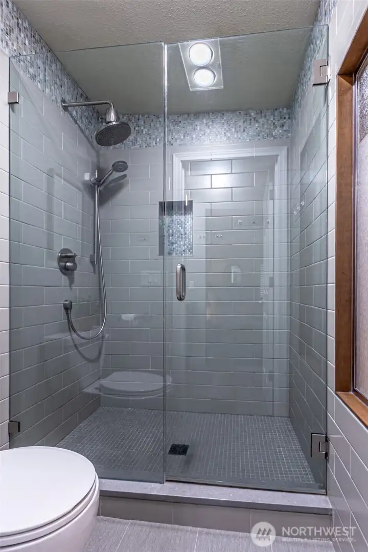 Oversized primary shower, check out all the tile detail.
