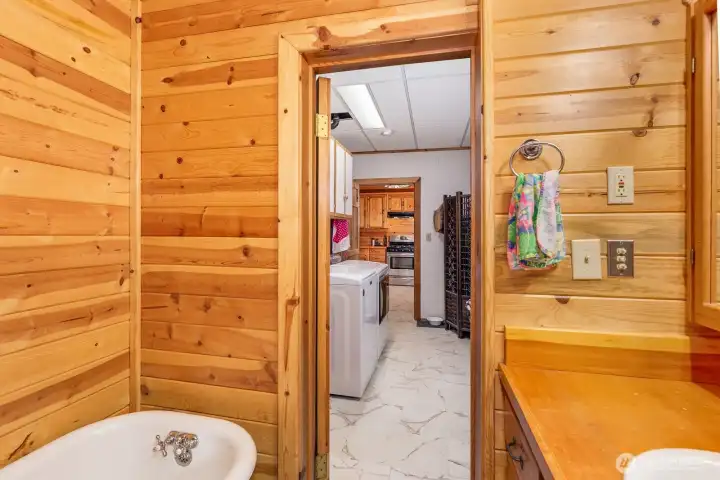 Main floor full bath and separate laundry room