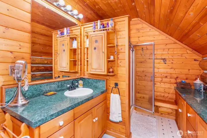 upstairs bathroom with a shower