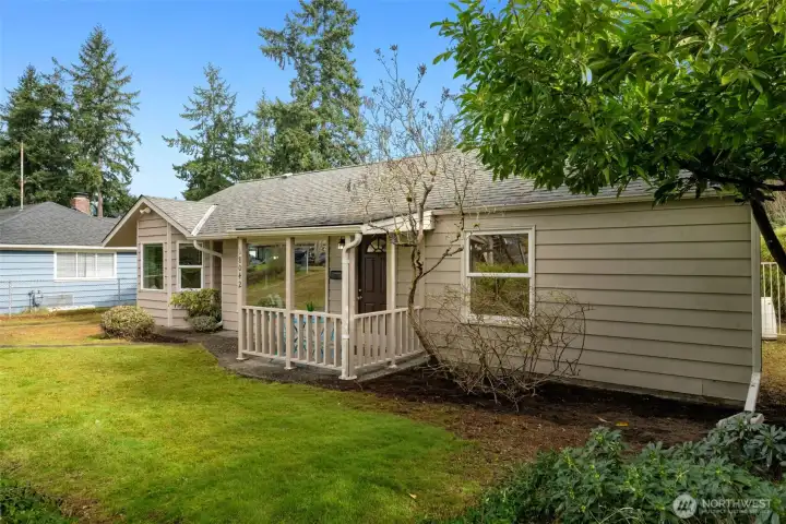 Surrounded by evergreens, it's a quiet block with sidewalks and mostly single family homes.