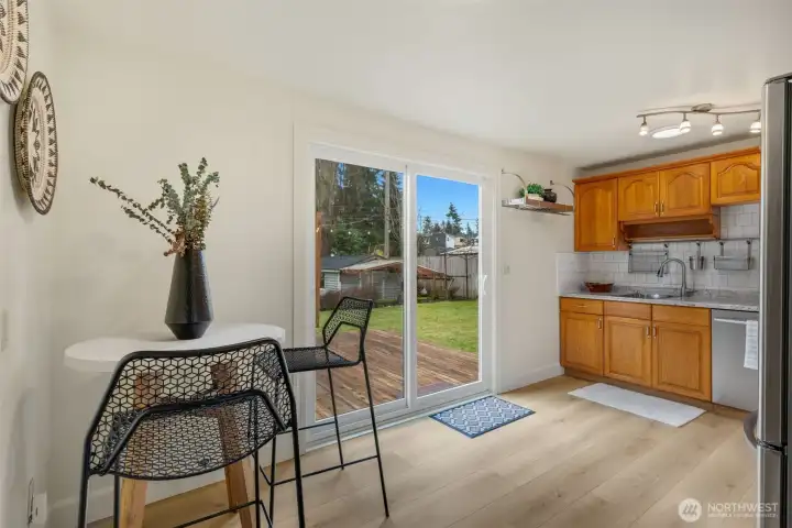 Great light and access out of the large sliders that lead to the deck and yard.