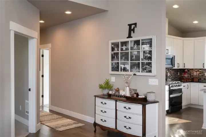 Entryway to hallway with stylish decor and warm welcoming design