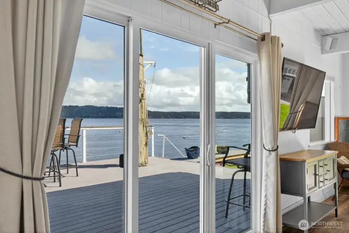 Big sliders & windows fill the room with natural light. There is a view from almost every room.