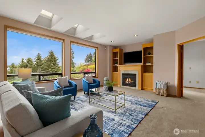 Den with french doors tucked back to the right.