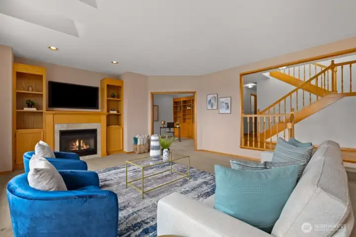 To the left of the stairs is where you will find the main floor laundry room and 3/4 bath.