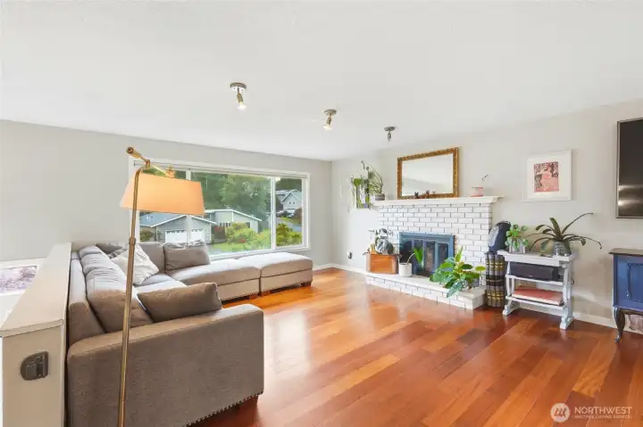 A wood-burning brick fireplace gives you a cozy, cost-effective heat source for those Pacific Northwest winters. A wood-burning brick fireplace gives you a cozy, cost-effective heat source for those Pacific Northwest winters.