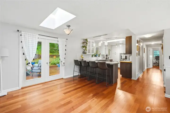 French doors open directly to the deck, making indoor-outdoor living as easy as turning a handle. French doors open directly to the deck, making indoor-outdoor living as easy as turning a handle.