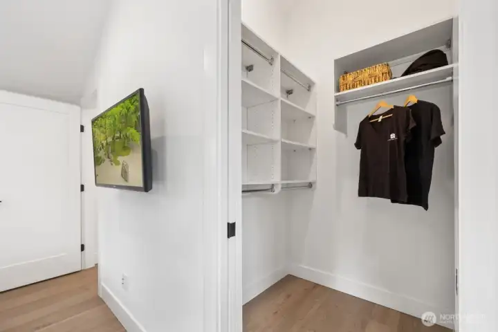 Spacious walk-in closet Spacious walk-in closet