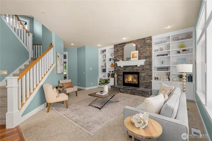 Living room with floor to ceiling fireplace & built-ins Living room with floor to ceiling fireplace & built-ins