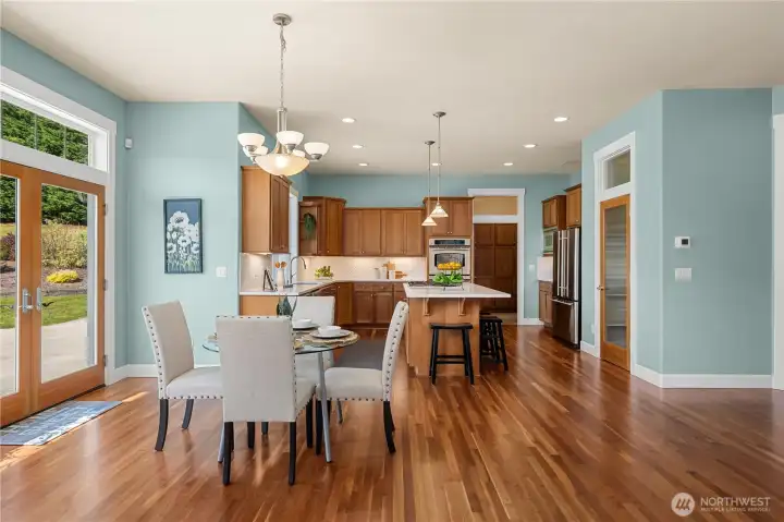 Living room flows into the vast kitchen space Living room flows into the vast kitchen space