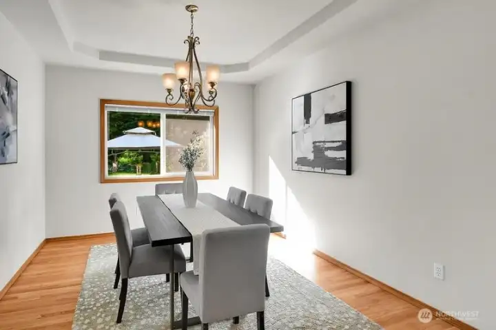 Formal dining room overlooks the back yard