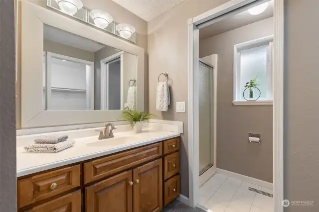 Primary Bath Area is Compartmented and the Vanity Area has access to the Walk-in Closet