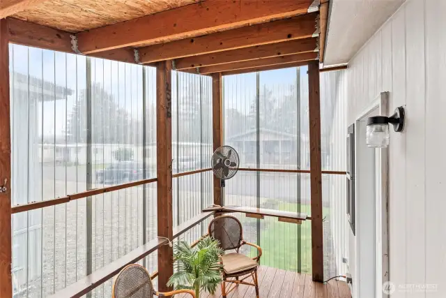 Enjoy year-round relaxation on the covered and enclosed porch — the perfect spot for morning coffee or a peaceful afternoon read.