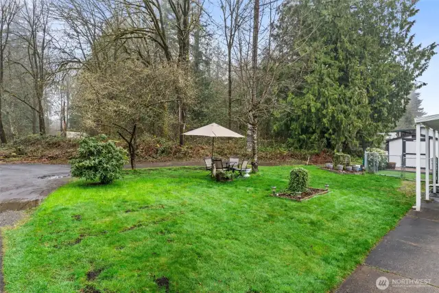 Tucked at the end of a quiet lane, this home enjoys added privacy with minimal drive-by traffic. Bonus: a charming outdoor seating area under a canopy.