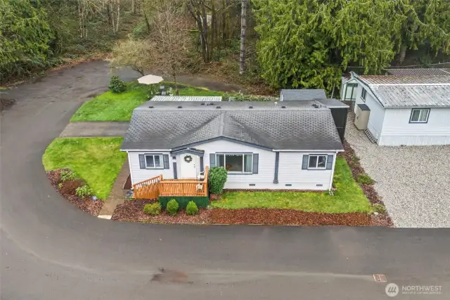 Aerial shot highlights the peaceful, wooded backdrop and ideal cul-de-sac setting.