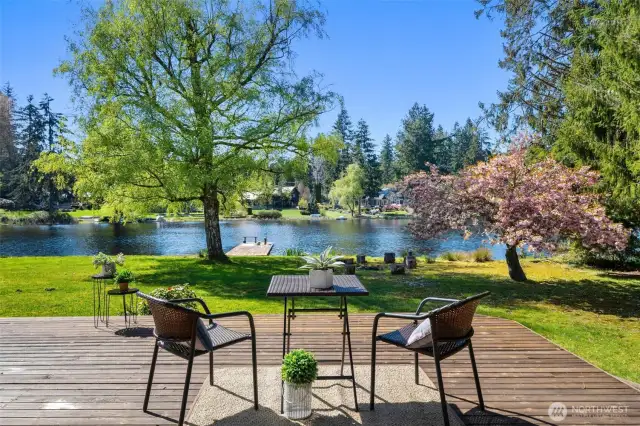 French Doors off Primary Open to the lake deck & views - perfect for morning coffee.