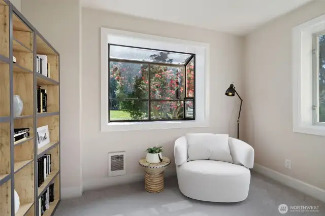 Small reading room or small bedroom on main with garden window and views of the lake off kitchen area - Virtually staged to show possibilities.