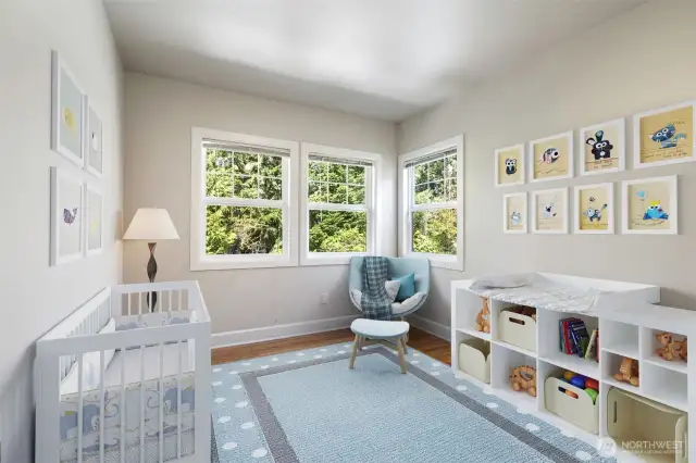 One of 3 2nd level bedrooms - original polished hardwood floors.  Virtually staged to show possibilities.
