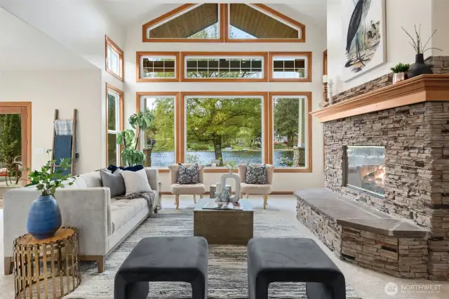 Large Living Room with High Floor to Ceiling Windows bringing in the Lake Views. Fresh Paint & Carpets through-out!