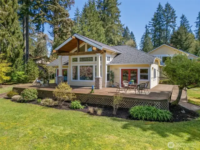 Lake Side of home showing backyard with firepit and easy access to lake fishing & fun