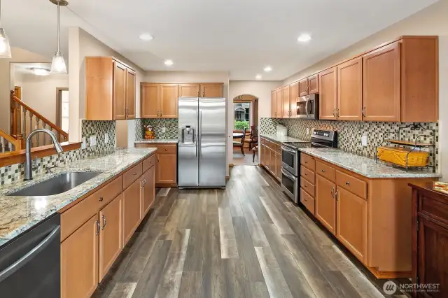 Generously sized kitchen with walk in pantry, double oven, loads of storage and so much counter space!