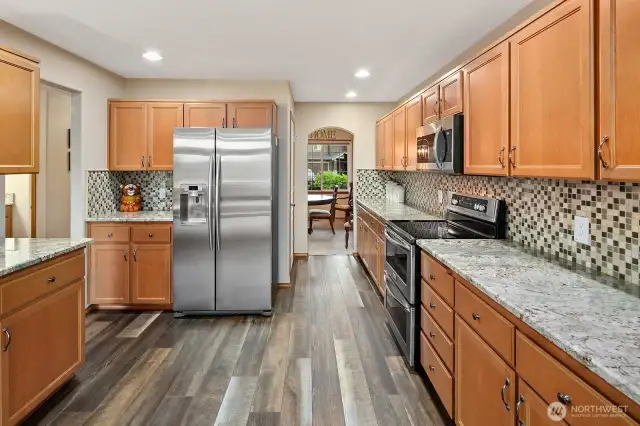 Walk in pantry situation between kitchen and dining room.