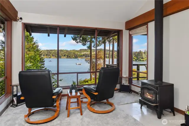 Beam accentuates the space plus a cozy wood-burning stove to complete the ambiance of relaxation and tranquility