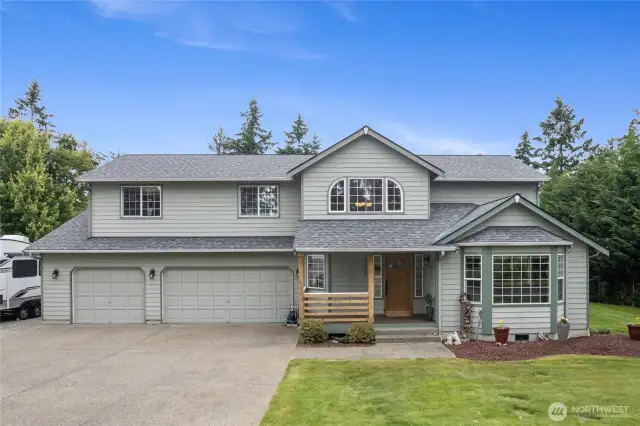 Four Bedroom well maintained home sitting on an acre feels like country living!