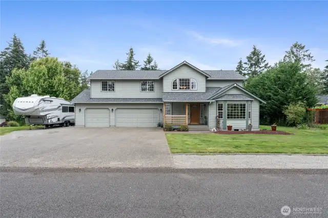 Four Bedroom well maintained home sitting on an acre feels like country living! RV Parking as well as a huge 3 car garage.
