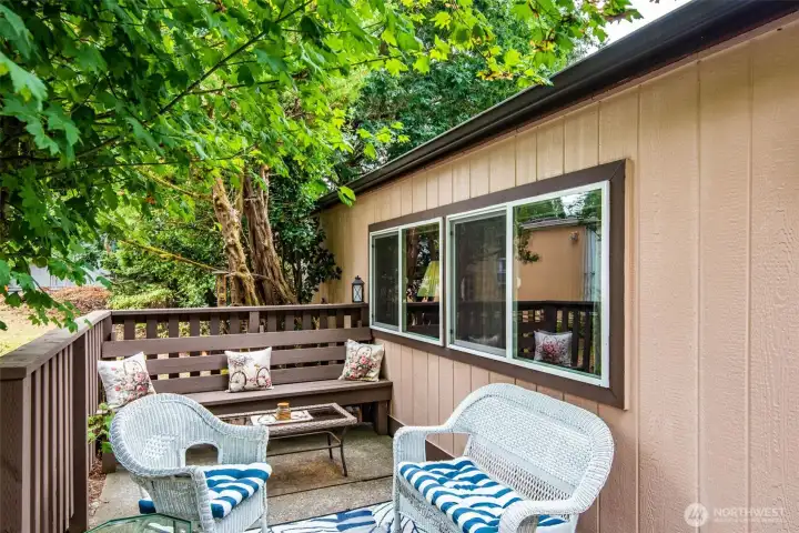Cozy outdoor seating area perfect for morning coffee or evening relaxation.