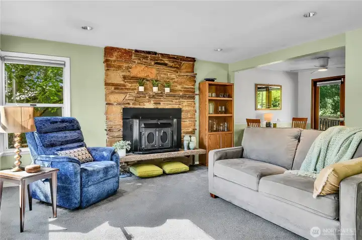 Mid Century stone fireplace with insert.