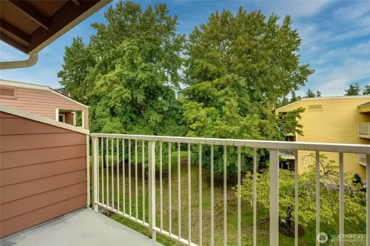 top floor balcony with view over the trails and waterway.